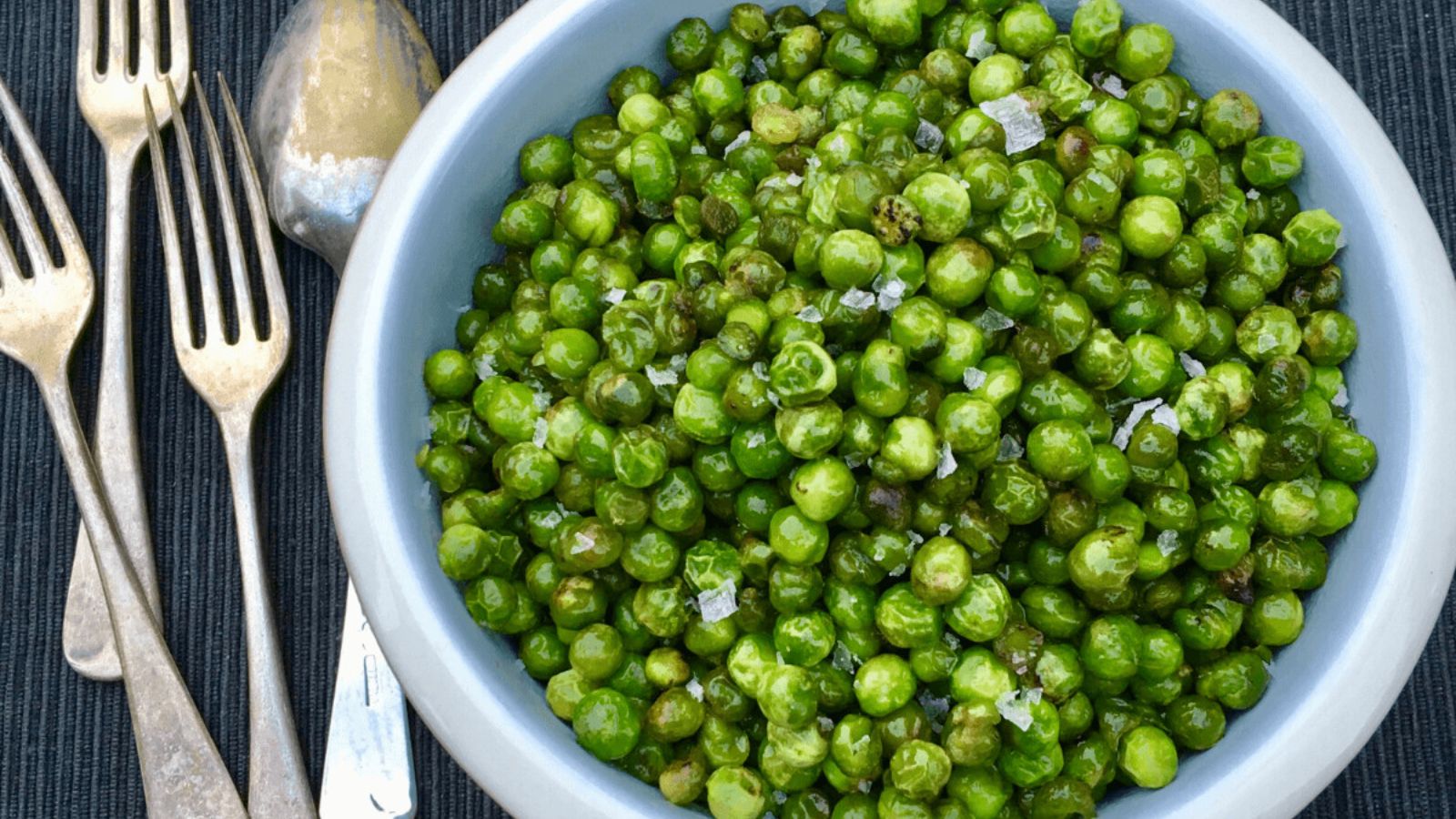 Fried green peas in a bowl.
