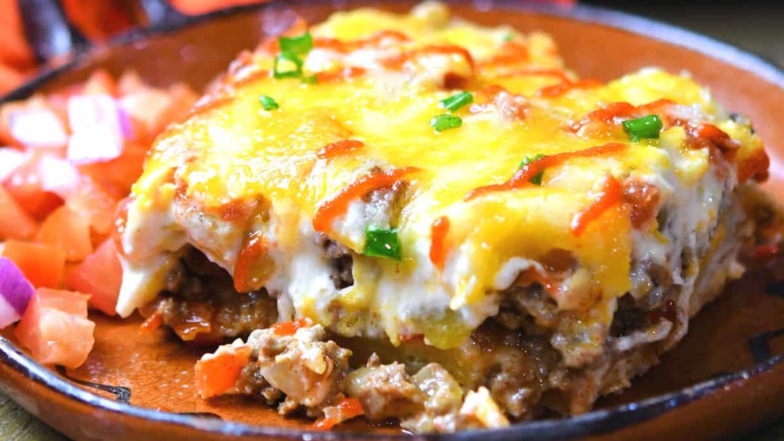 A slice of cattle drive casserole on a plate.