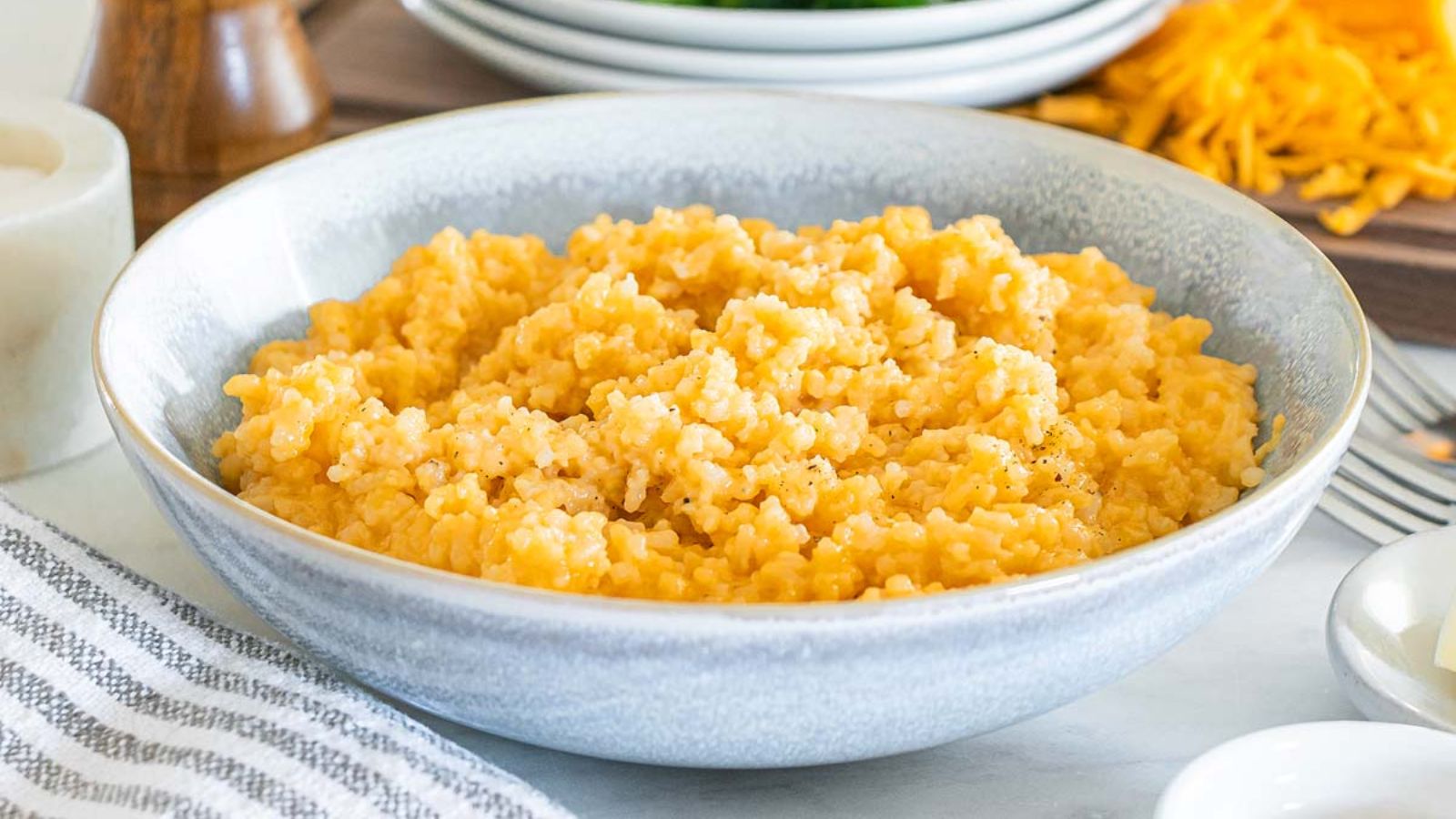 Cheesy rice in a bowl.