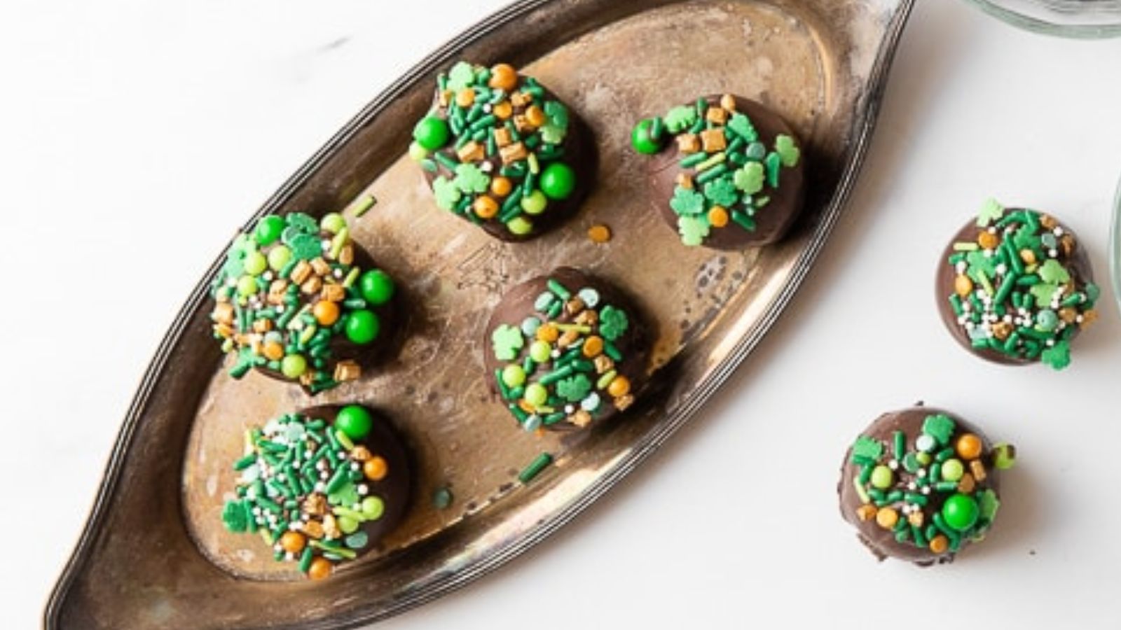 Chocolate truffles on a plate.
