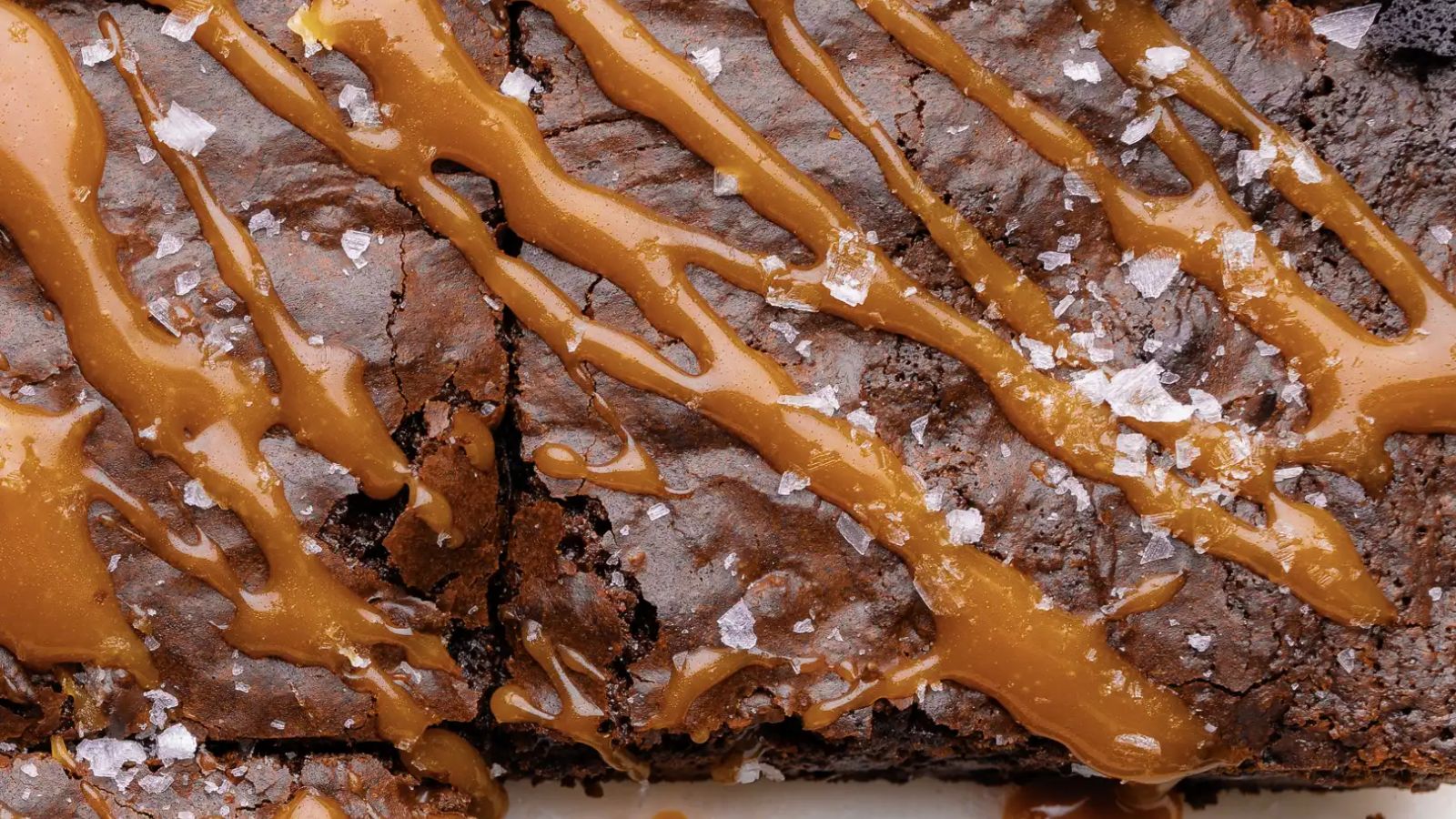 Chocolate brownies with caramel drizzle.