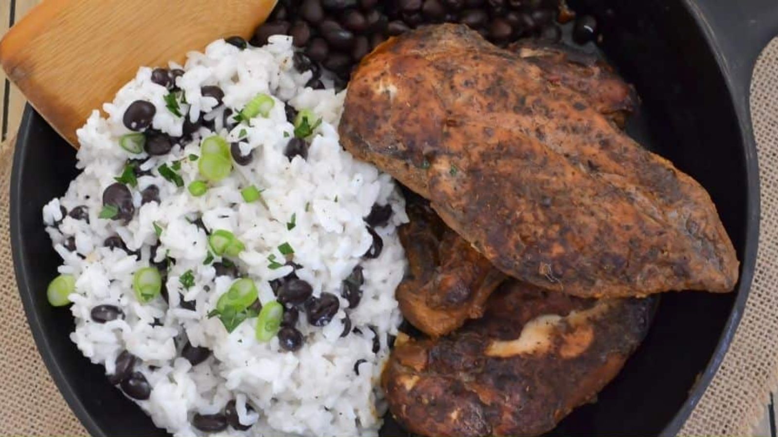 Coconut rice with chicken in a bowl.