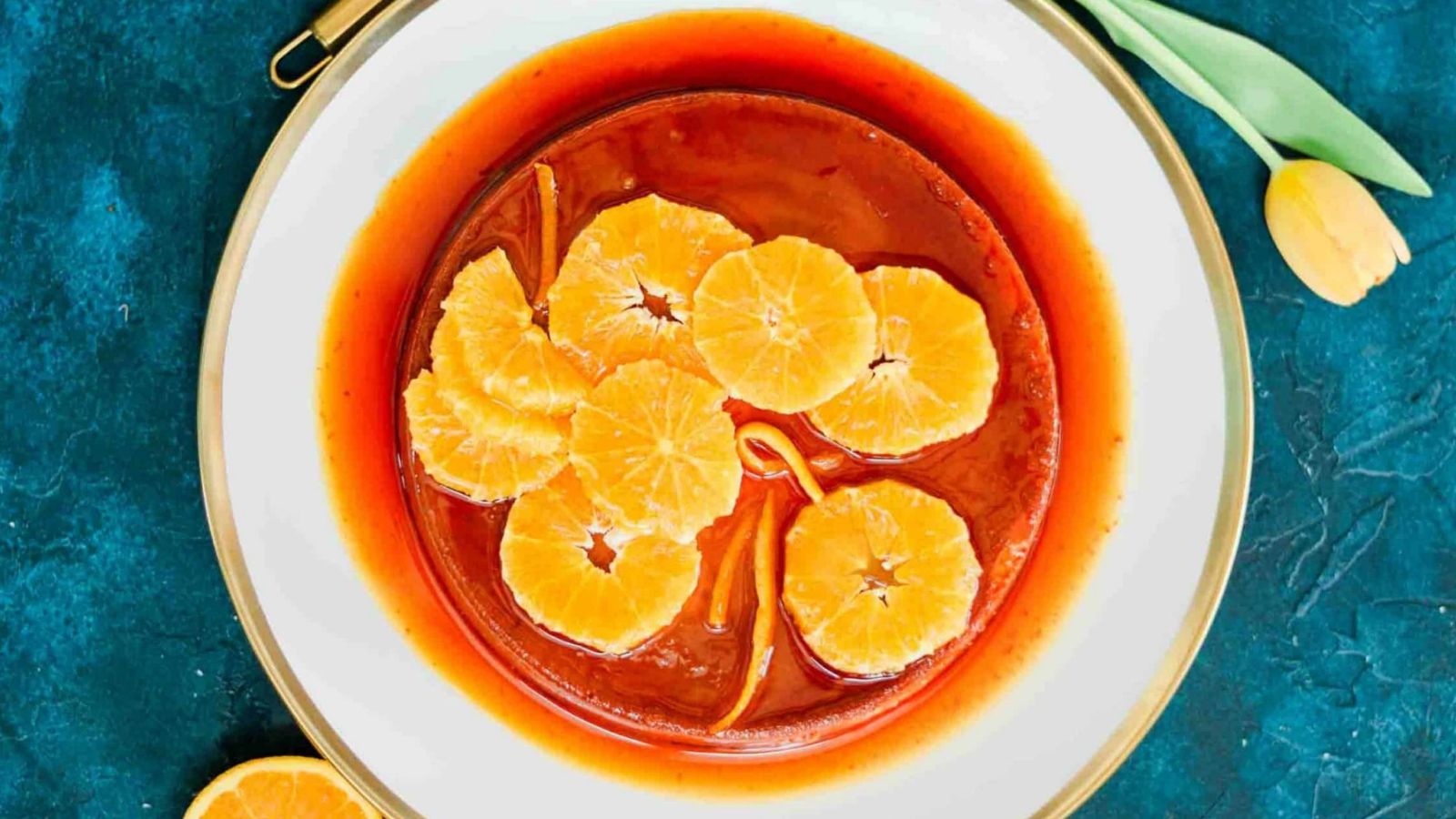 Orange flan on a plate.