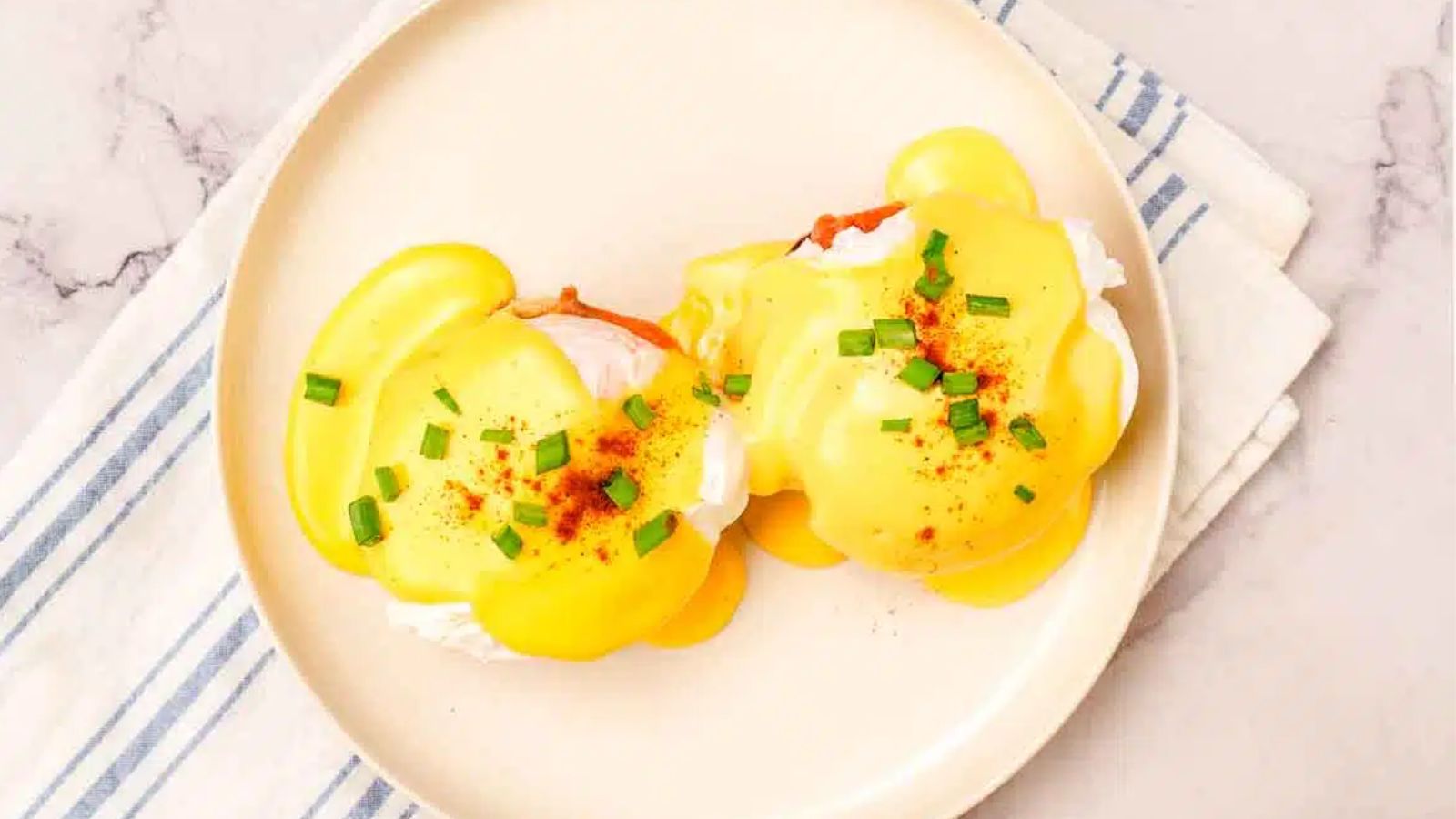 Eggs norwegian on a plate.