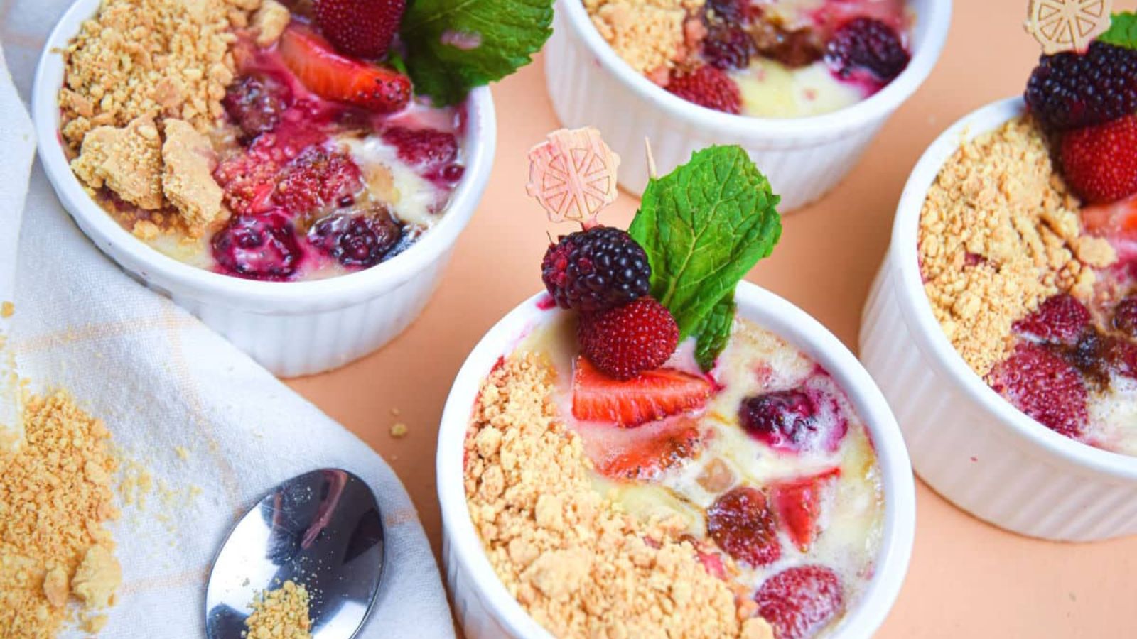Skillet berries and cream in mugs.
