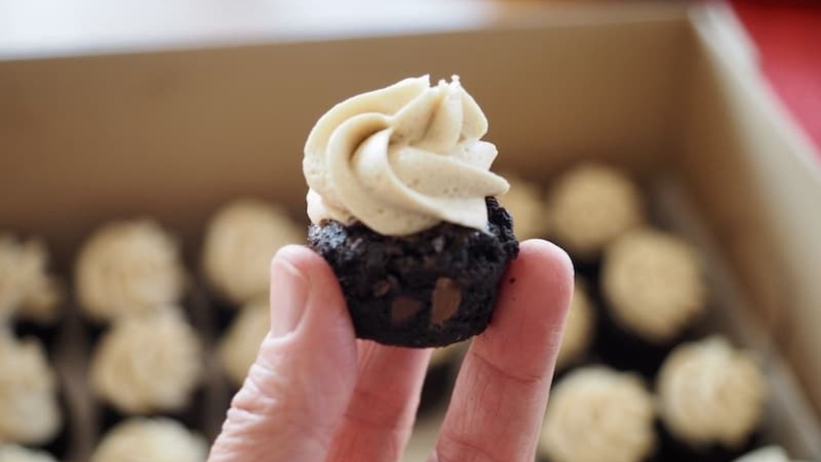 Brownie bites with frosting.