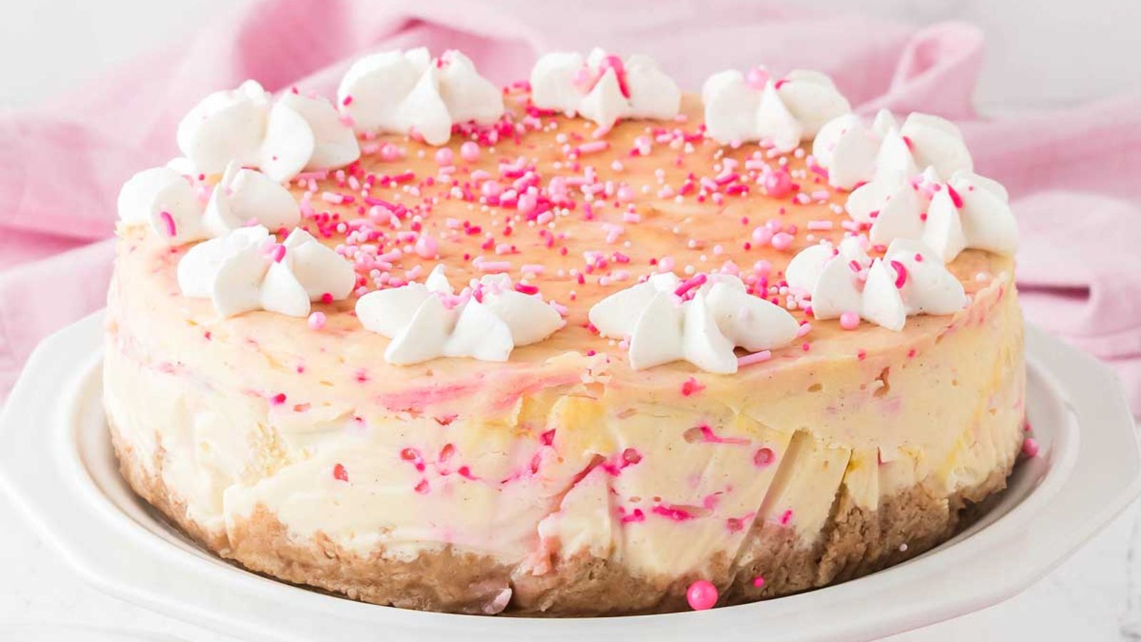 Pink birthday cheesecake.