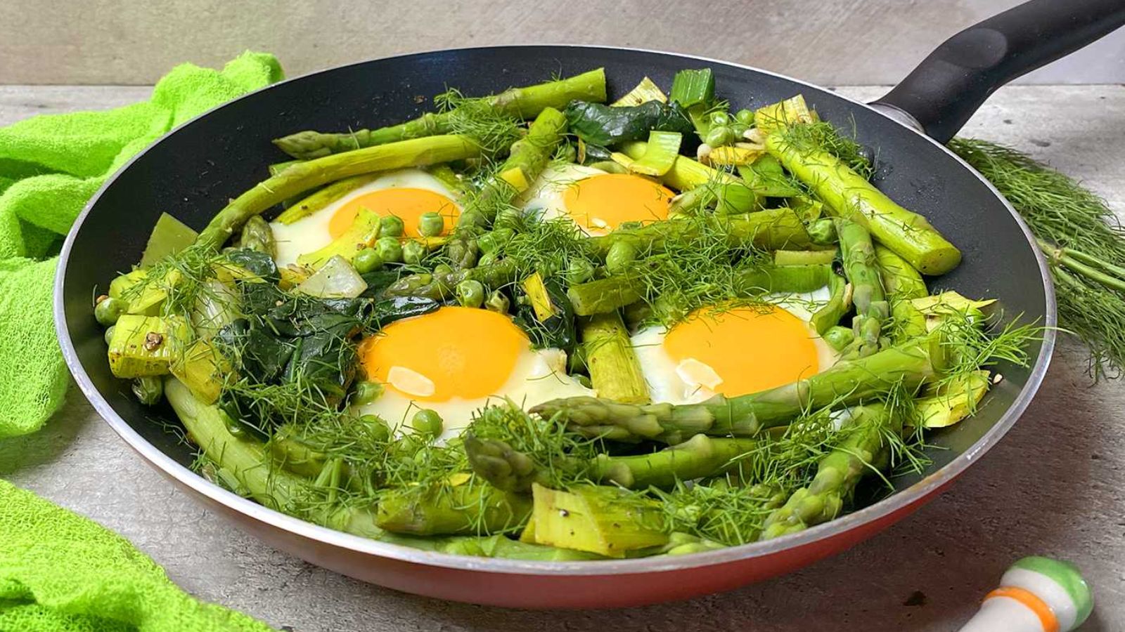Green shakshuka with eggs.