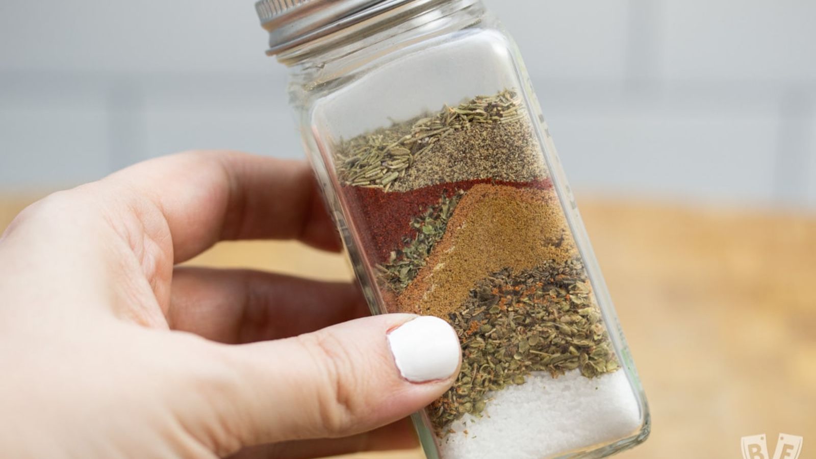 Fajita seasoning in a condiments bottle.