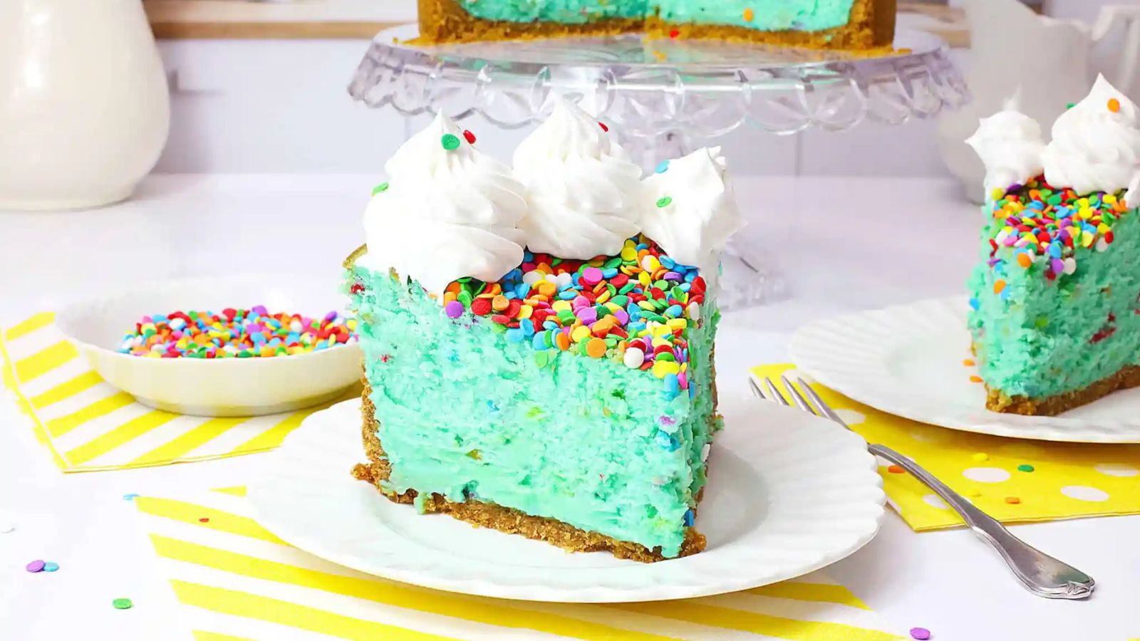 A slice of birthday cake on a plate.