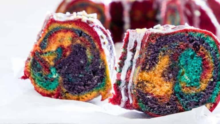 Slices of rainbow bundt cake.