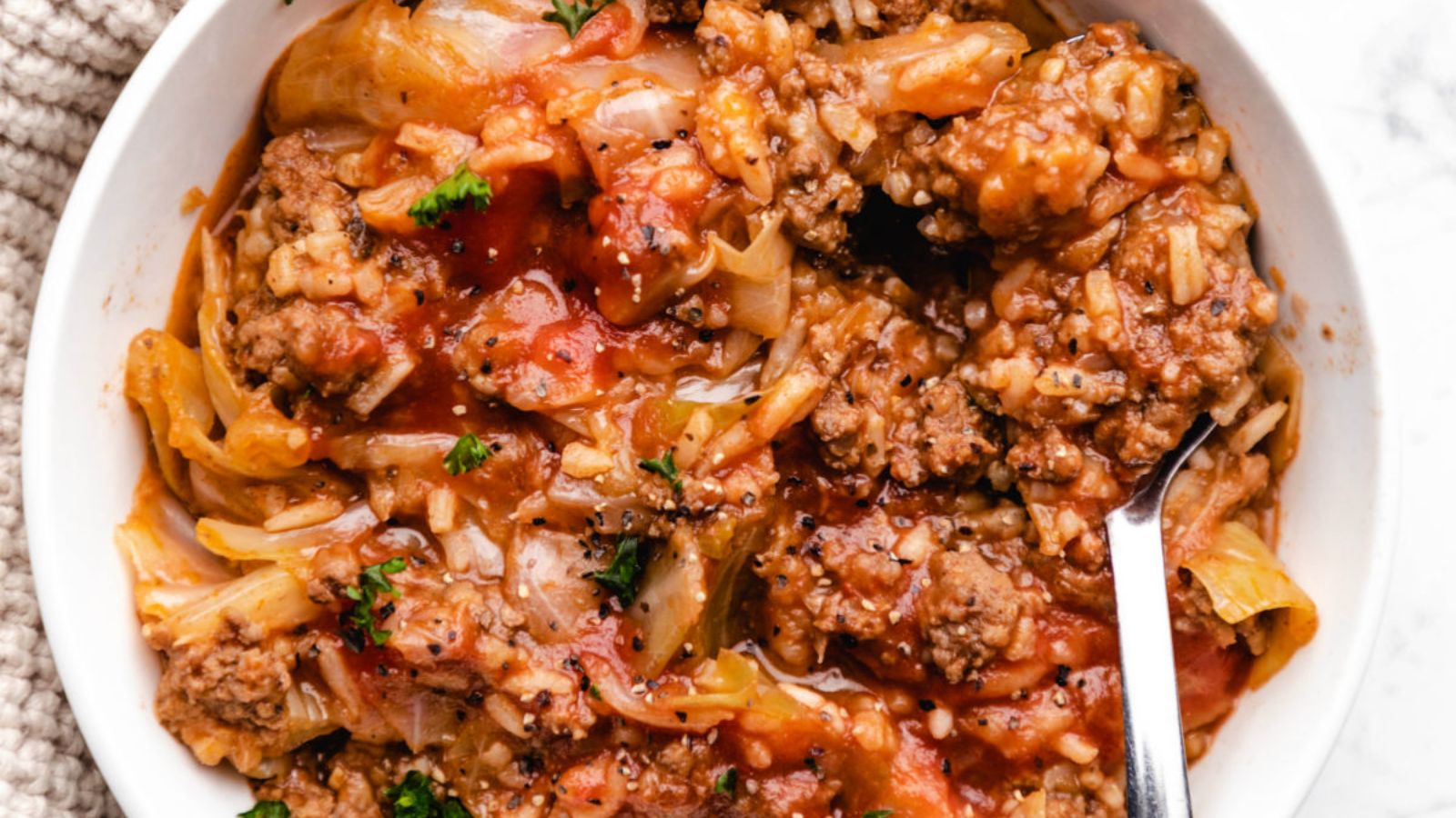 Unstuffed cabbage rolls in a bowl.