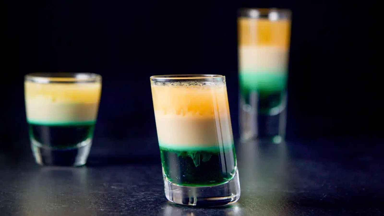 Irish flag shots on a black background.