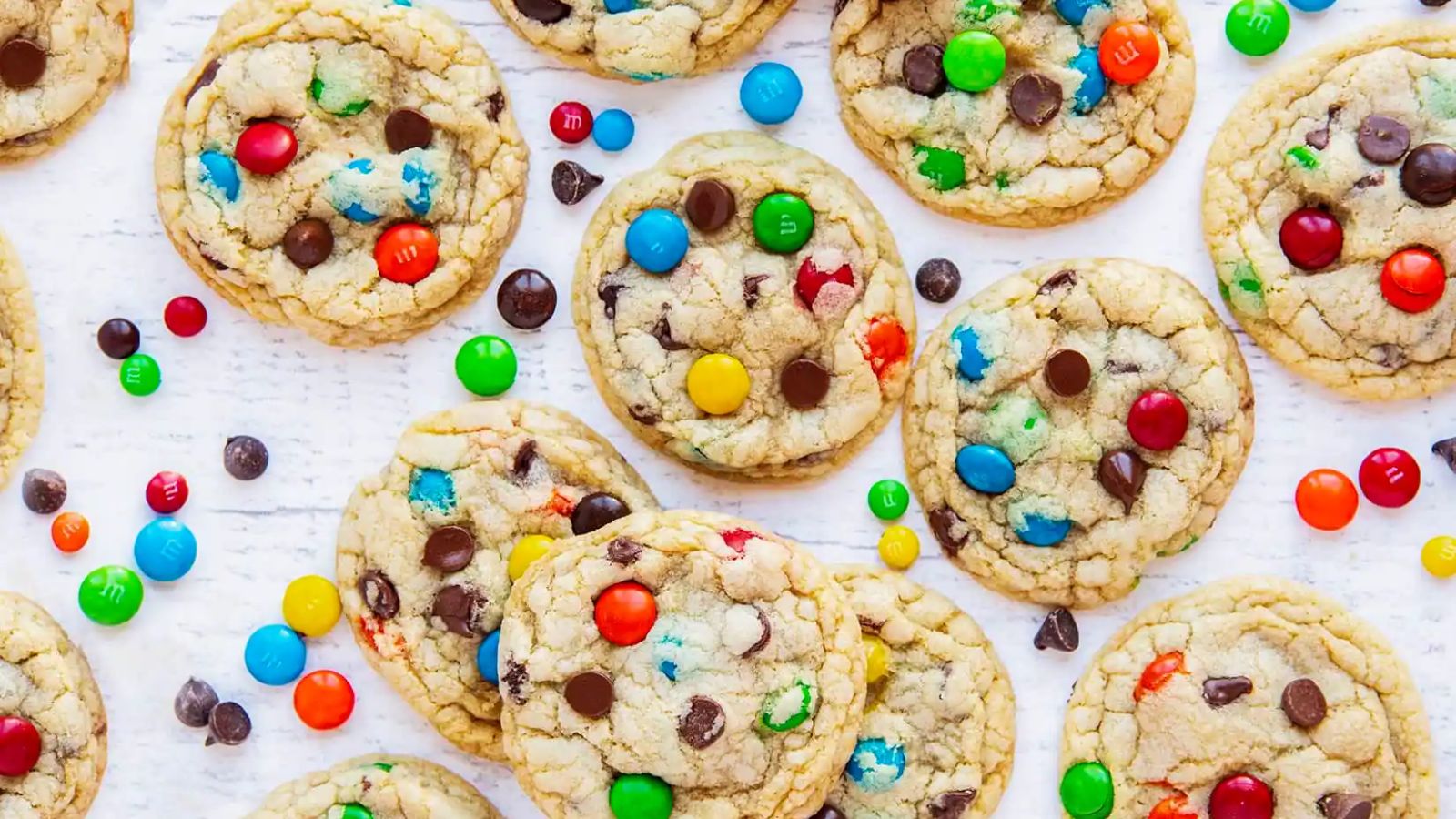 M&M cookies on na white surface.