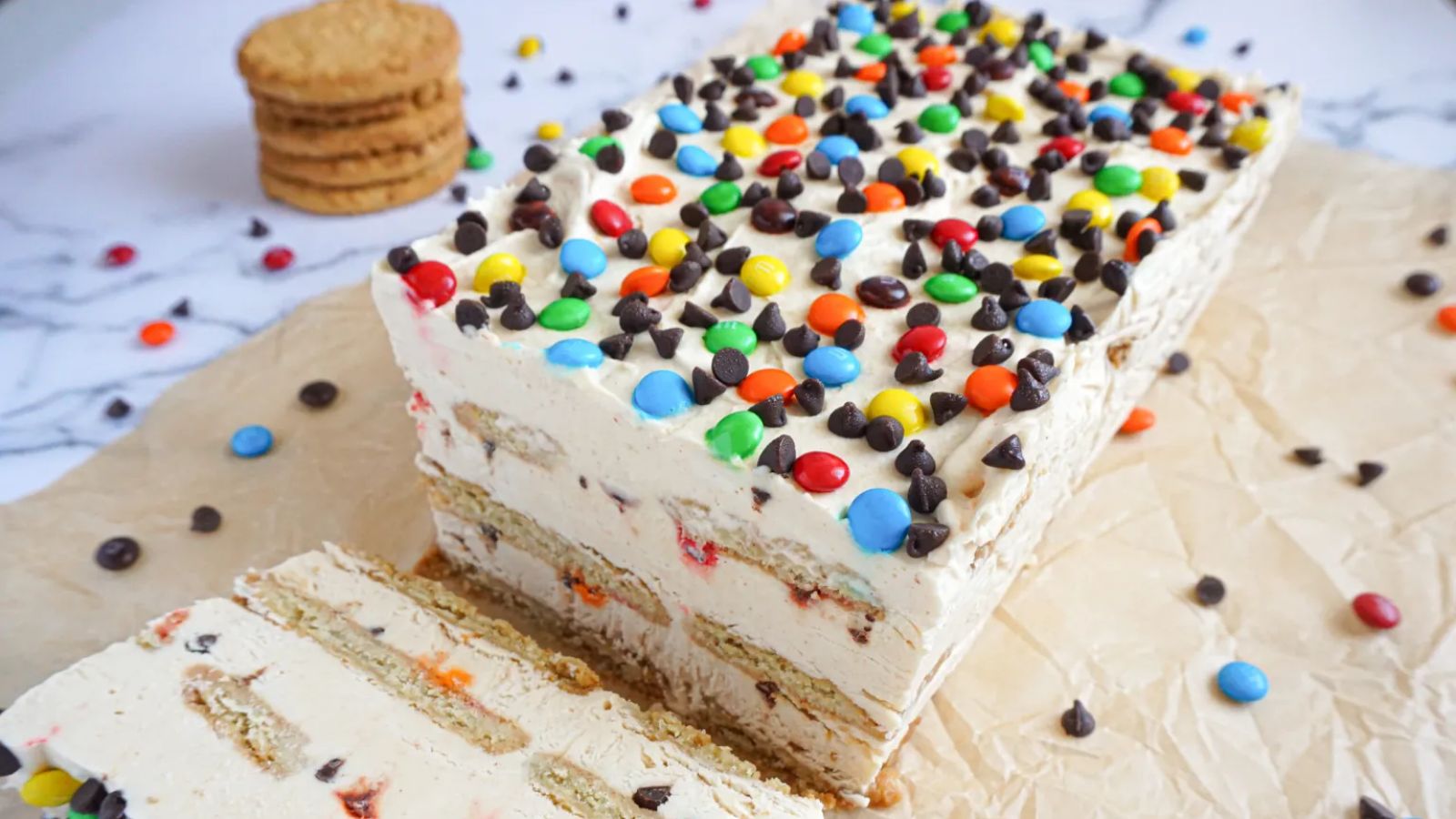 Cookie icebox cake with chocolates.