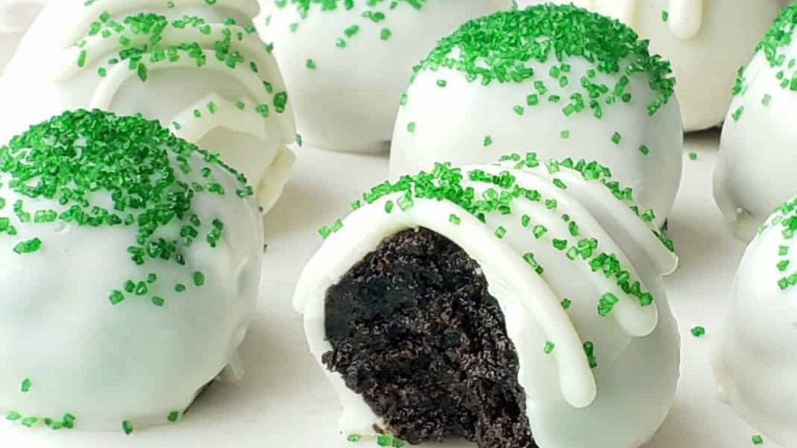 Oreo mint truffles on a white surface.