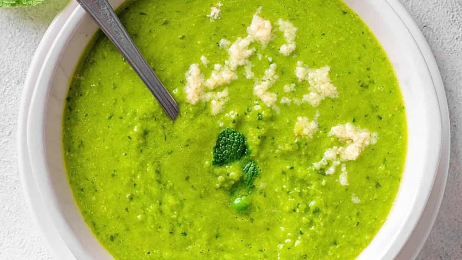 Pea and mint soup in a bowl.