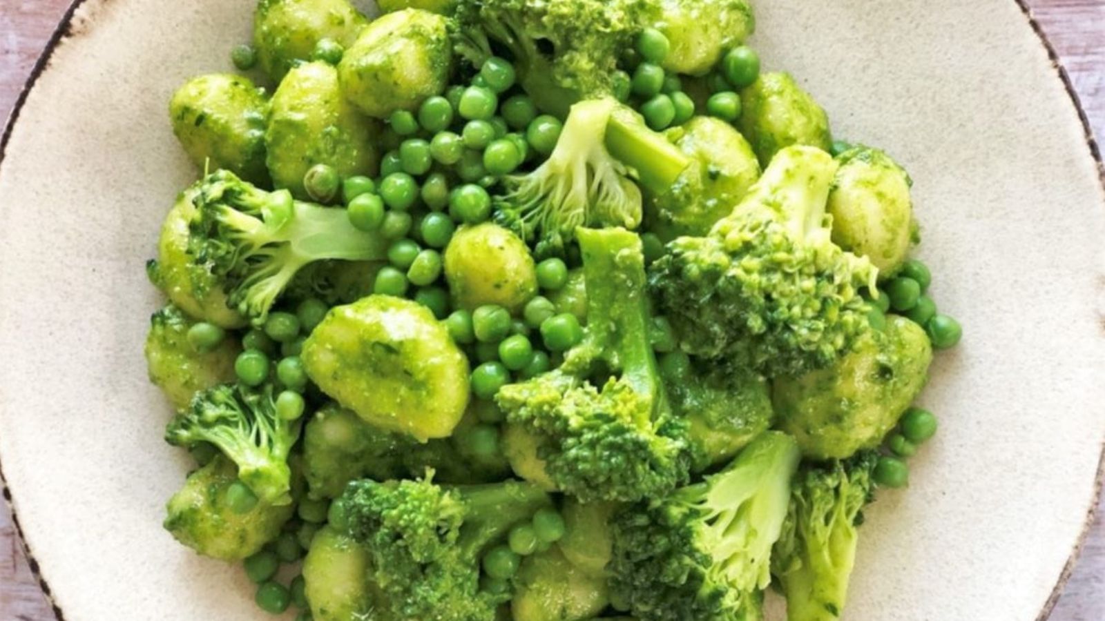 Pesto gnocchi on a plate.