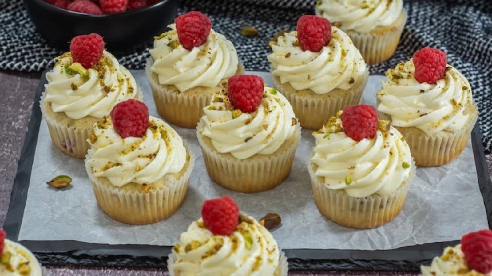 Raspberry cupcakes with pistachios.