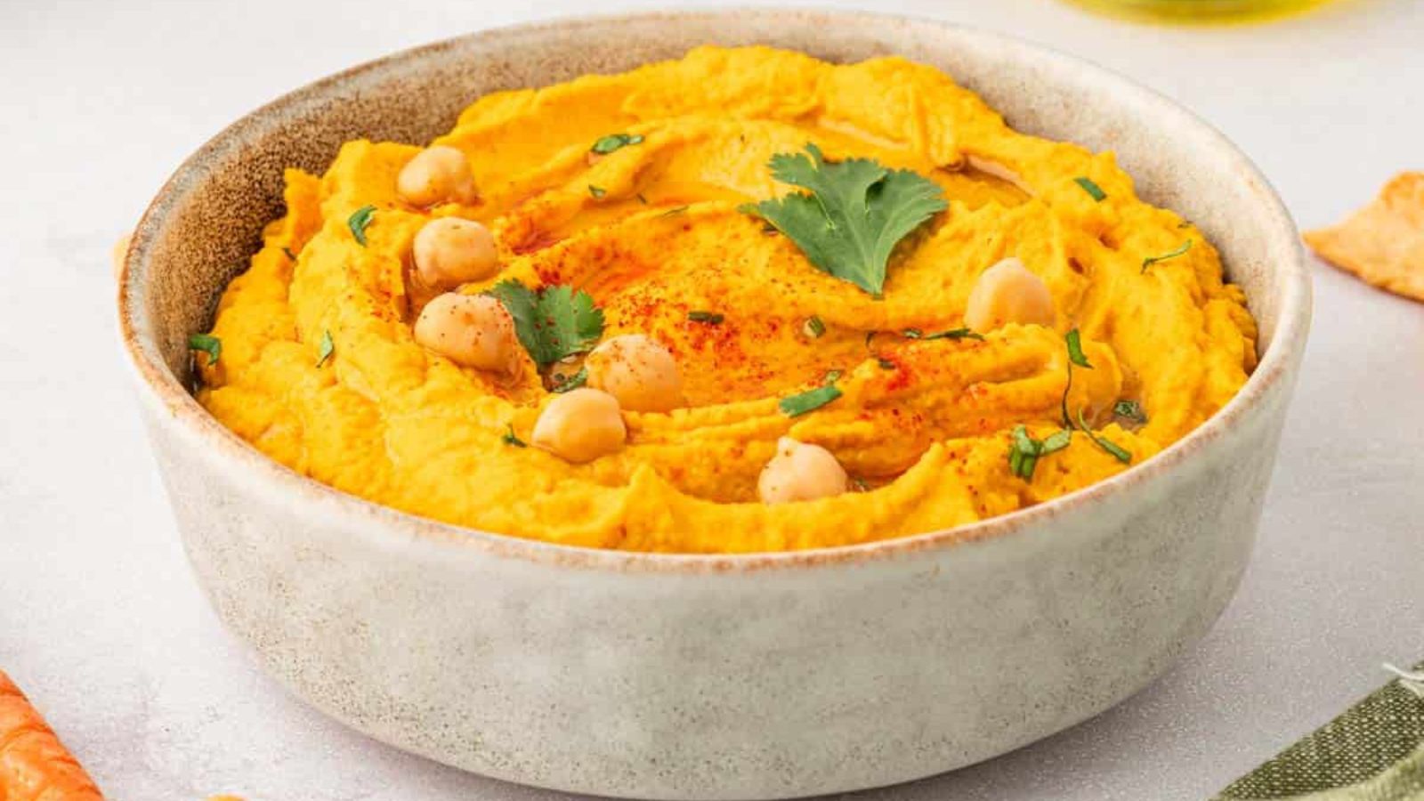 Carrot hummus in a bowl.