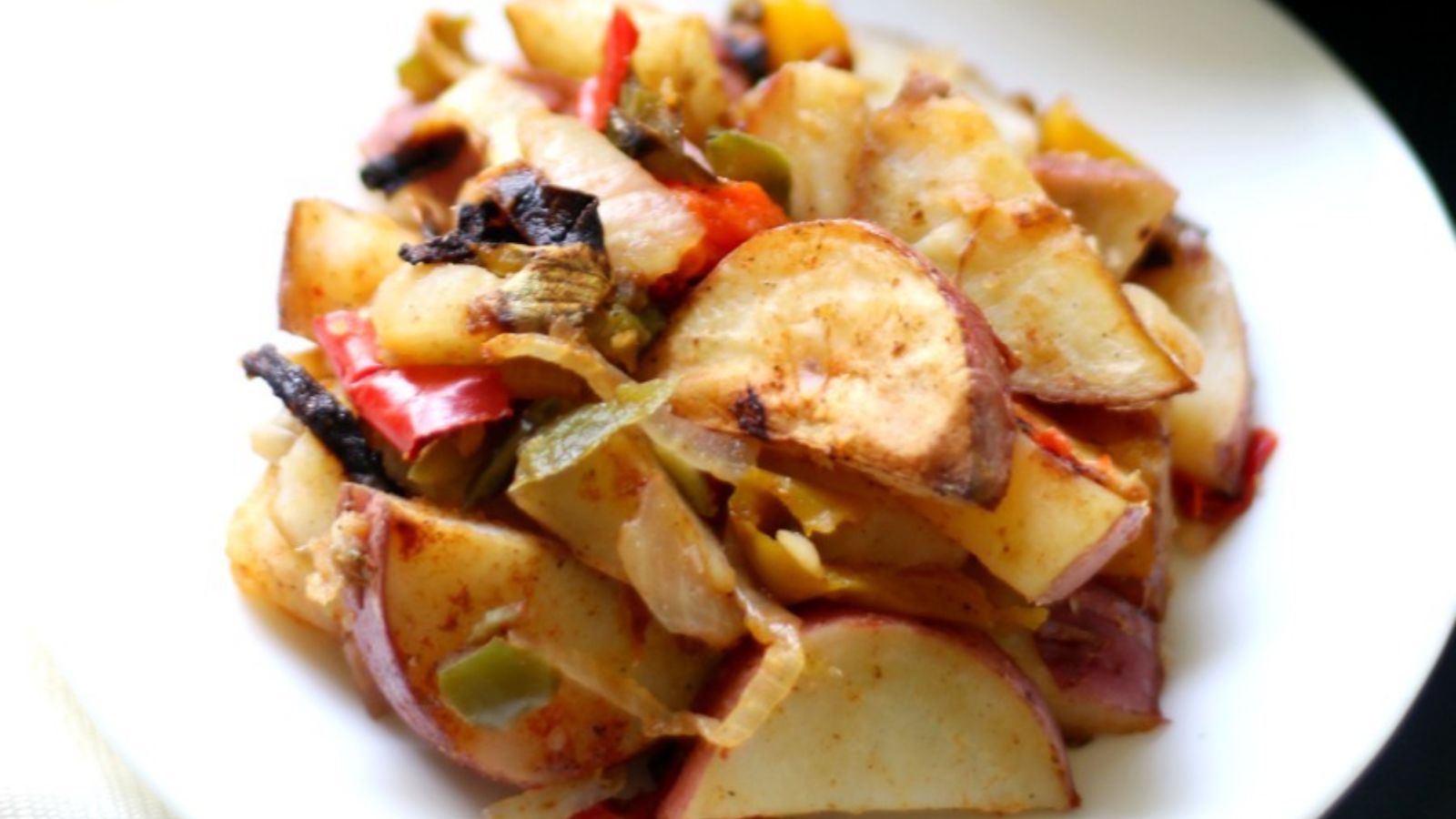 Roasted potatoes on a plate.