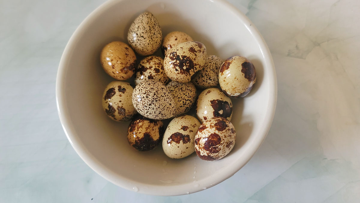 Quail eggs in a bowl.