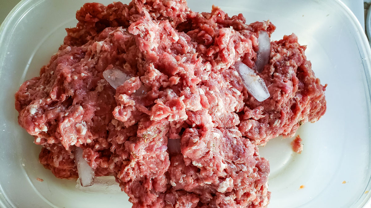 Spices mixed in with meat.
