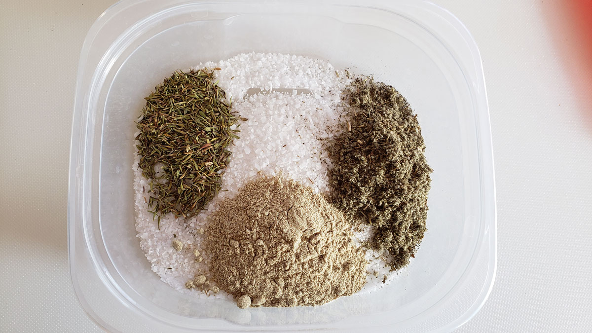 Spices in a tupperware container.