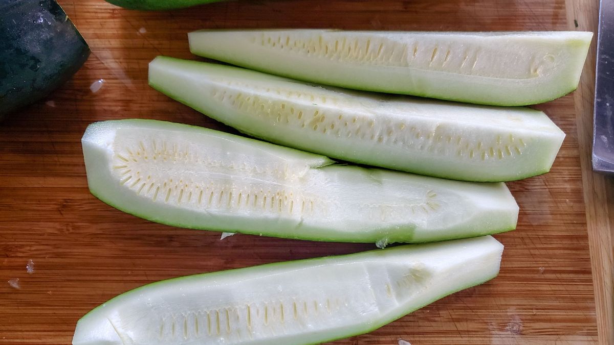 Quartered zucchini white seeds scraped out.