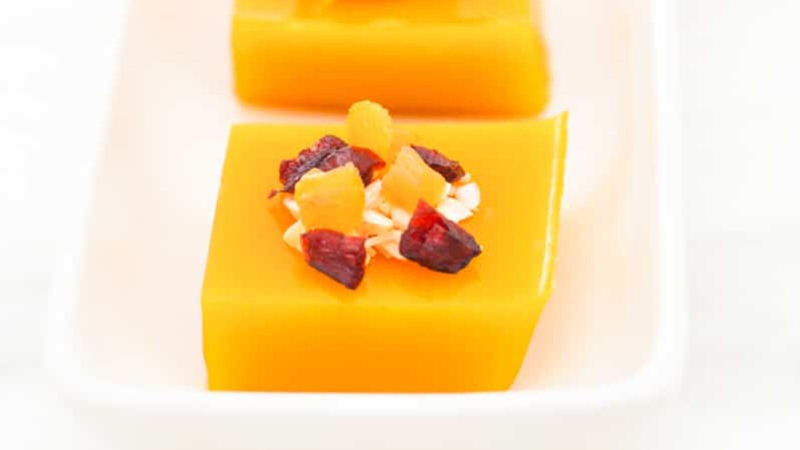 Mango pudding bites close up shot.