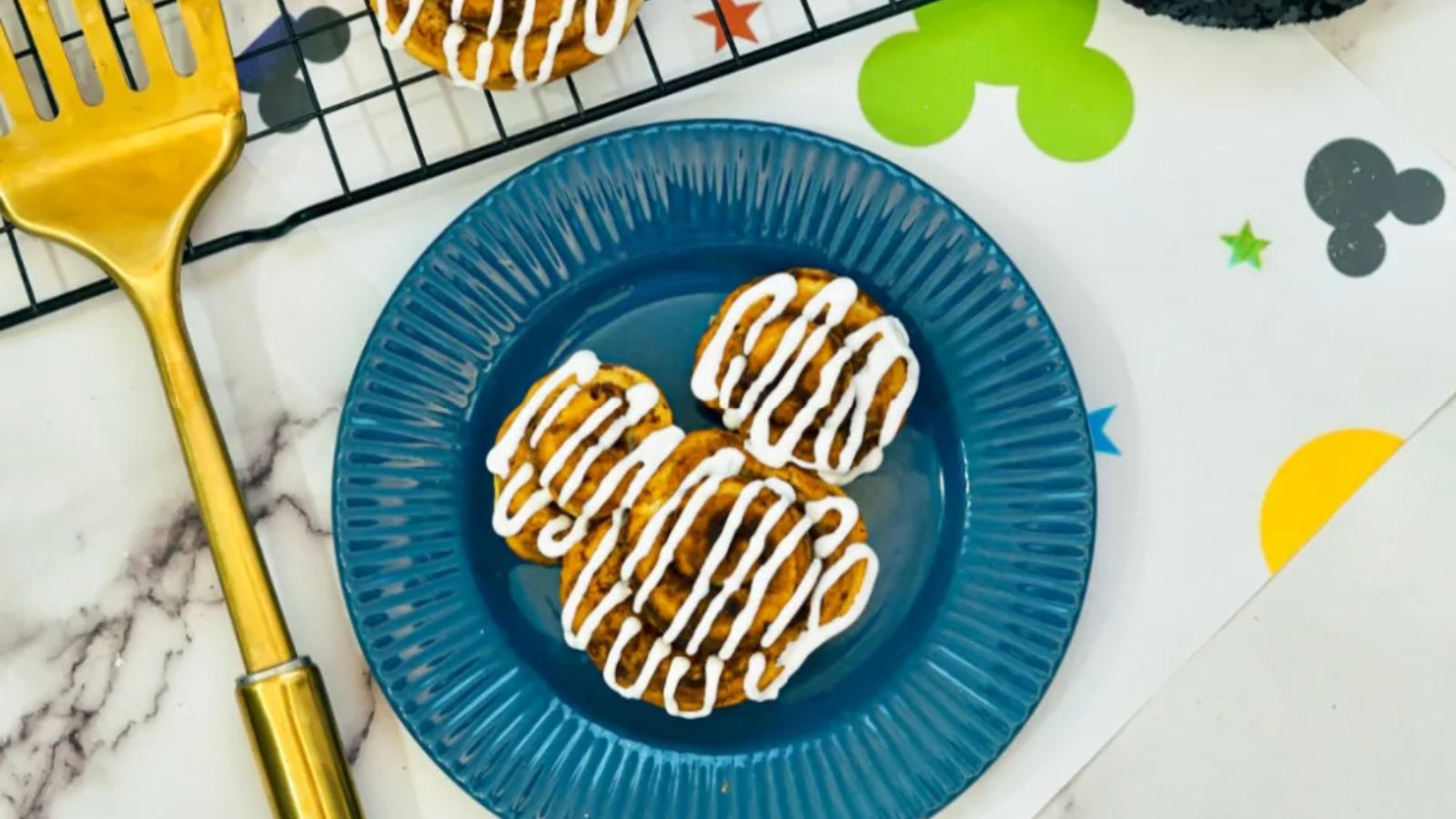 Cinnamon rolls on a plate.