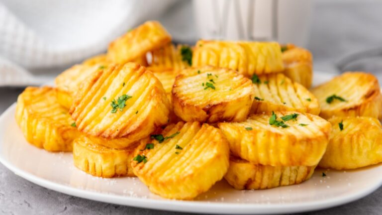 Air fried potatoes on a plate.