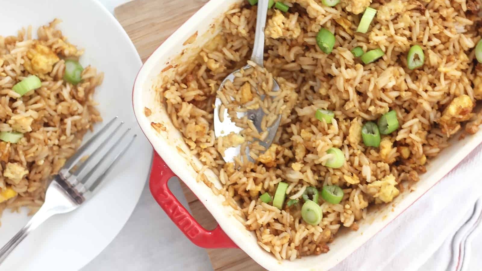 Fries rice with egg in a tray.