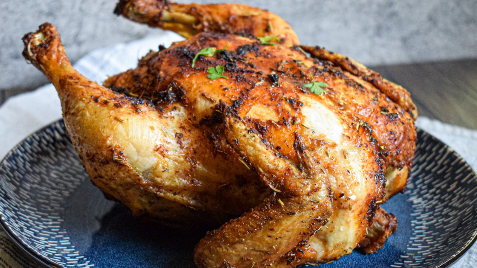 Whole chicken on a plate.