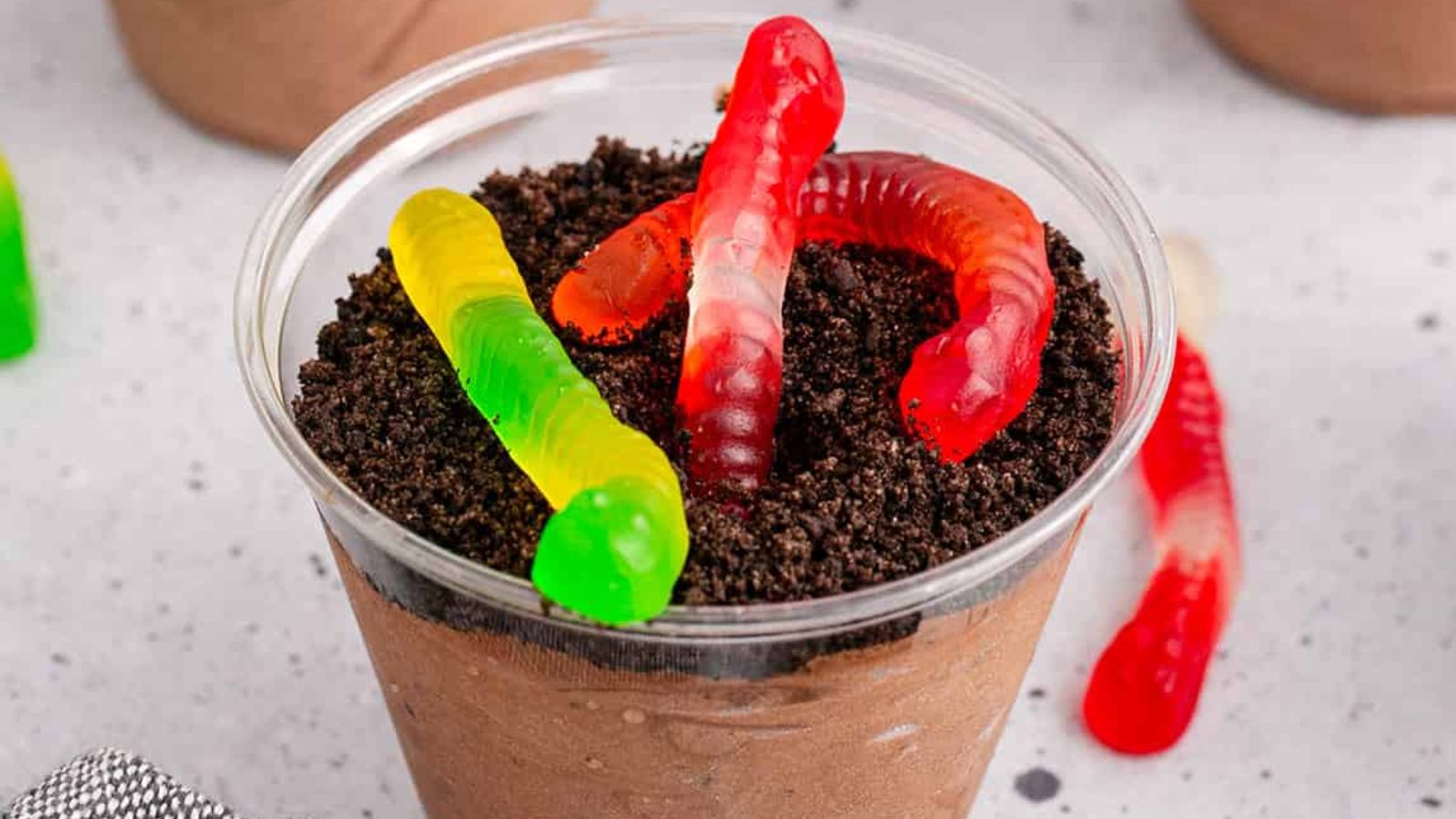 Chocolate with worm in a cup.