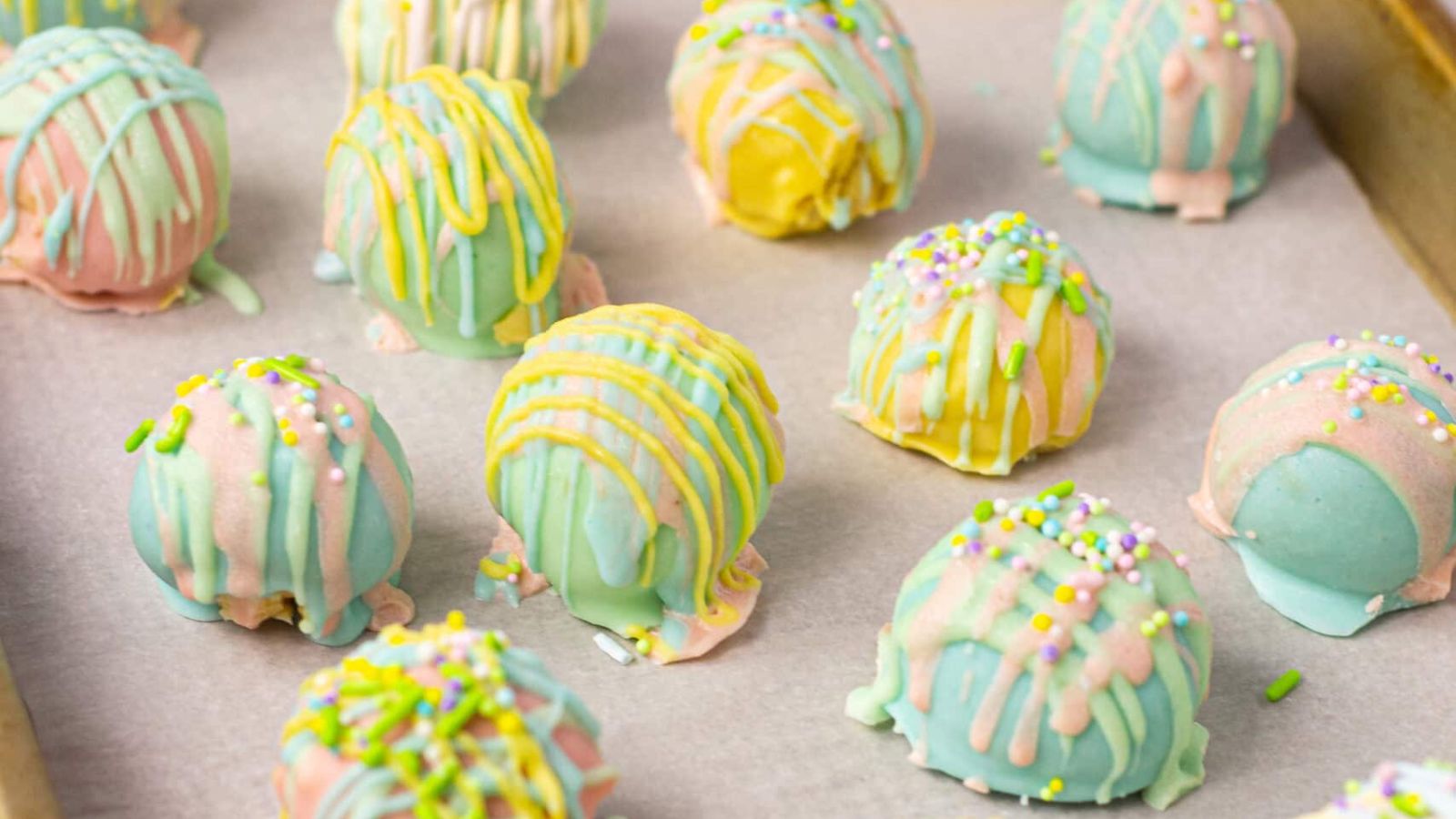 Oreo truffles on parchment paper.