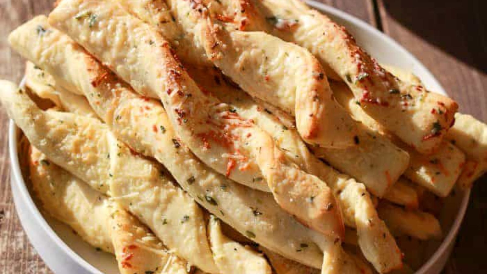 Garlic parmesan breadsticks close up shot.