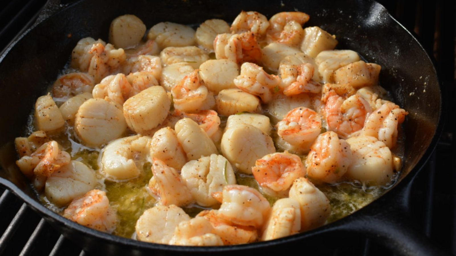 Scallops in a pan.