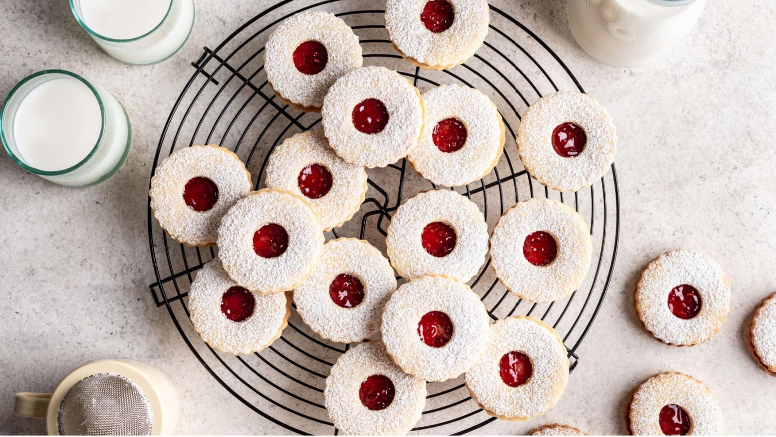 Linzer cookies on a drying rack.