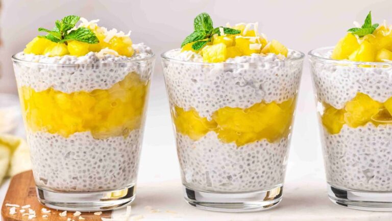 Three glasses of pineapple coconut chia puddings.