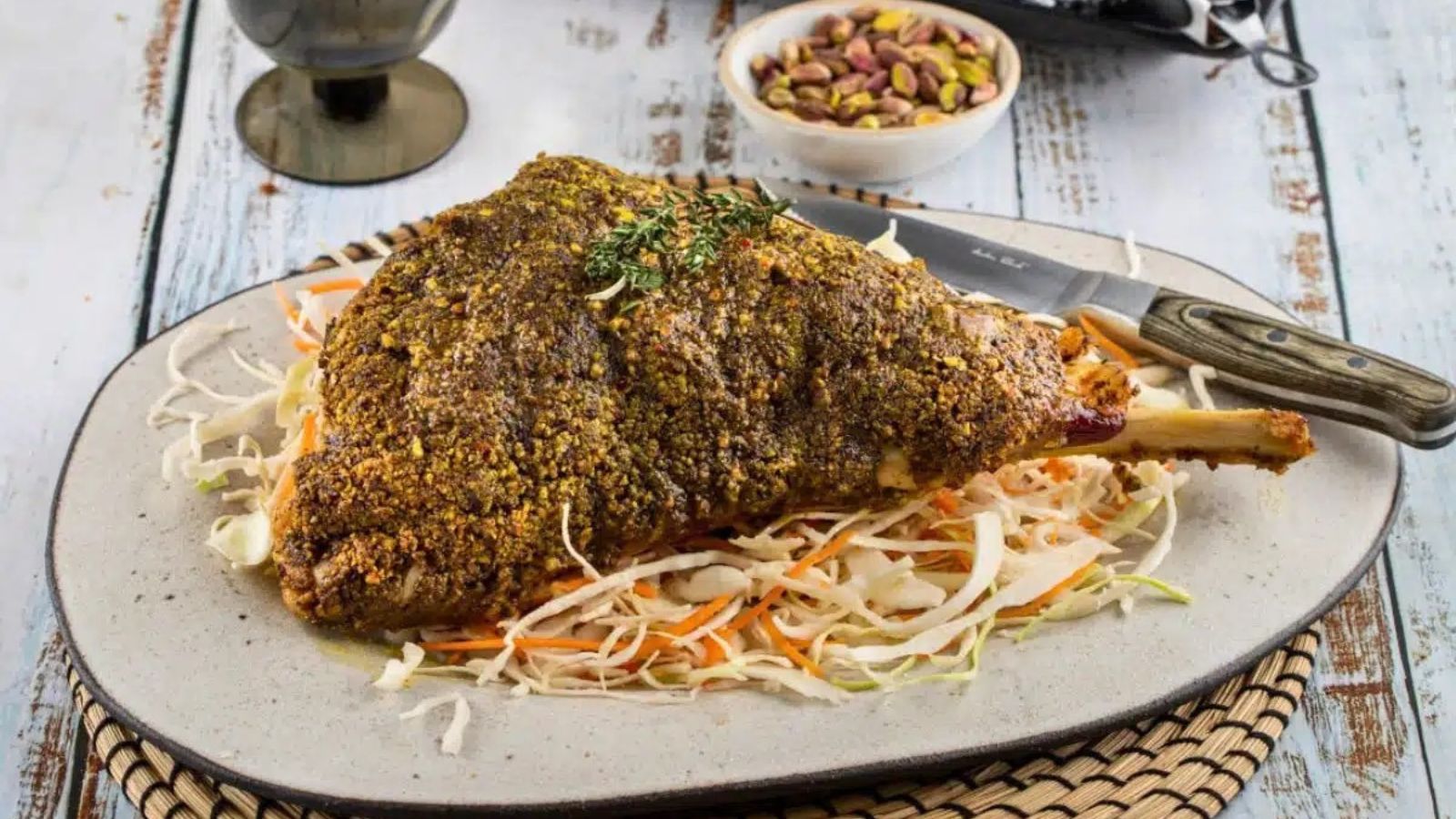 Pistachio  Crusted Leg on a plate.