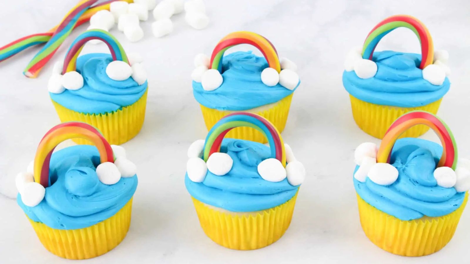 Cupcake with rainbow candy topping.