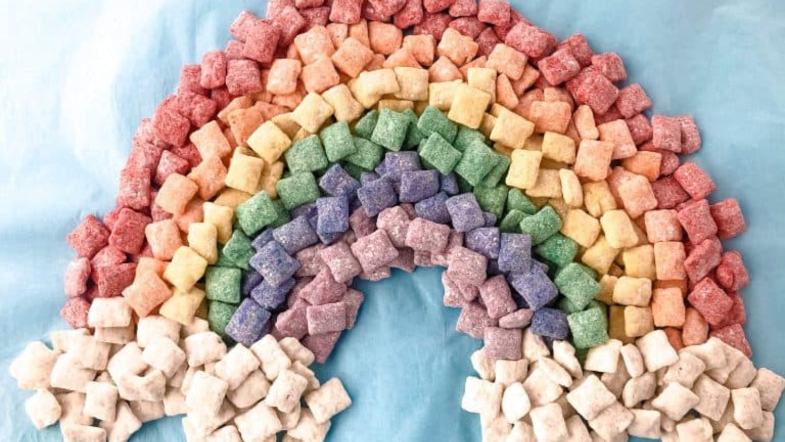 Rainbow puppy chow close up shot.