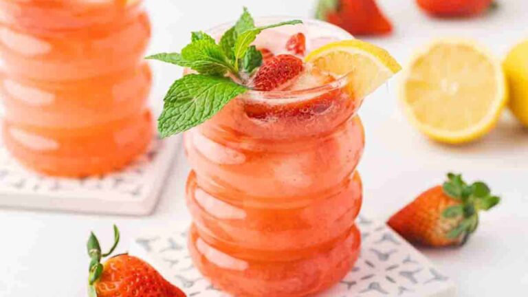Strawberry lemonade mocktail in a glass.