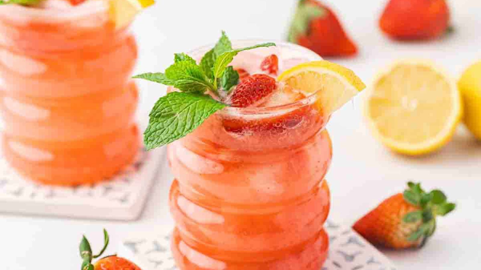 Strawberry lemonade mocktail in a glass.