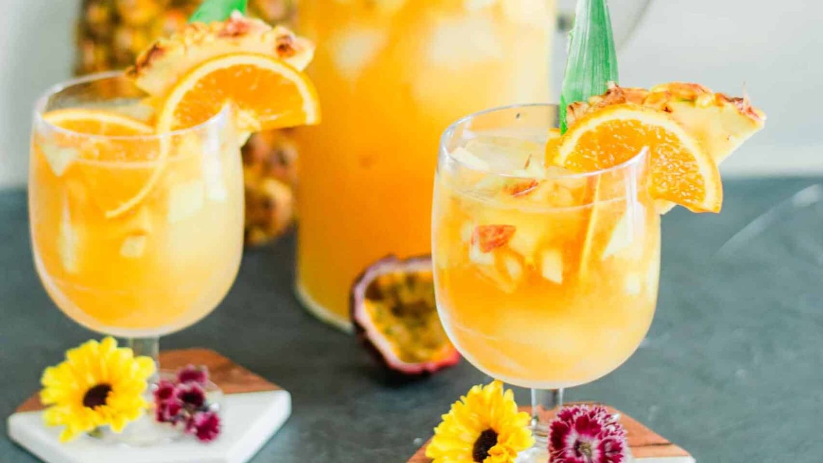 Sangria with passion fruit in a glass.