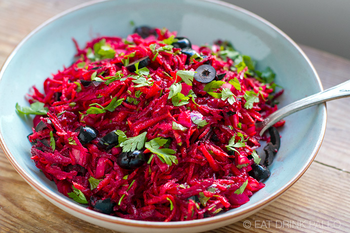 Beet slaw in a blue bowl.