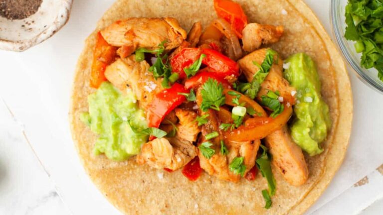 Chicken fajita in a white surface.