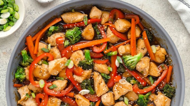 Stir fry chicken teriyaki in a bowl.