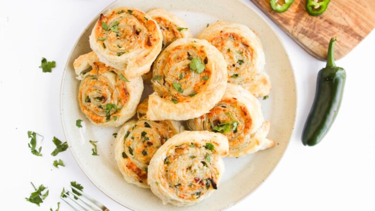 Top view shot of Jalapeno Popper Pinwheels on a plate.